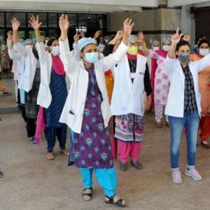 No salary, Covid workers threaten to jump off hospital