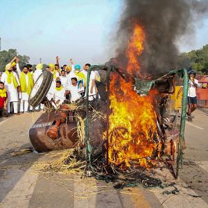 SEE: Cong workers set tractor afire at India Gate