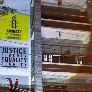 Amnesty India's assets attached in PMLA case