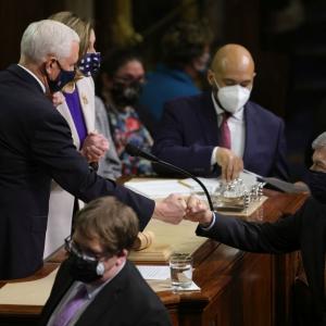 PIX: Fist bumps greet US Congress ratifying Biden win