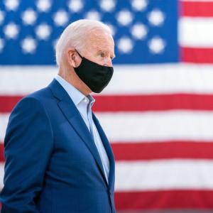 Biden launches 'wartime' plan against COVID-19