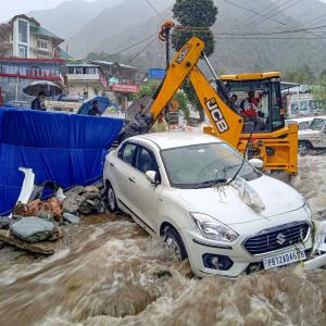 Dharamshala: Cars, bldgs swept away in flash floods
