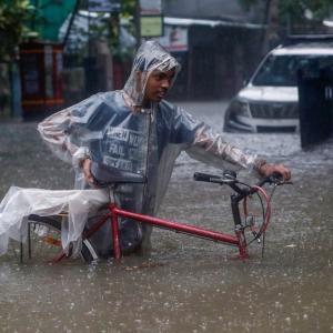 Heavy rains drench Mumbai; local train services hit