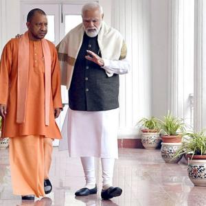 Yogi posts pic of walking with Modi, Twitter goes nuts