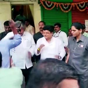 Maha suspends 10 cops after ink attack on minister