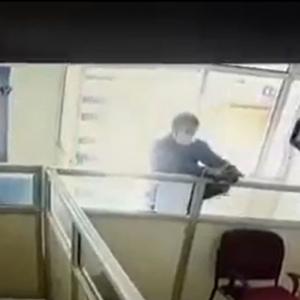CCTV footage shows terrorist shoot at bank employee