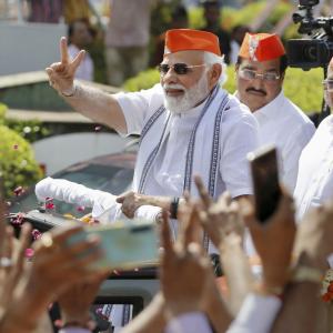 Day after results, Modi holds roadshow in Gujarat
