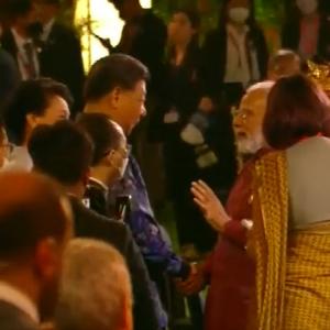 Modi, Xi come face to face at G20 dinner, shake hands
