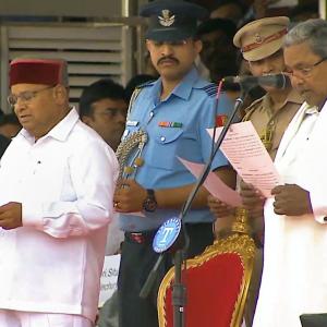 Siddaramaiah sworn in as K'taka CM, DKS his deputy
