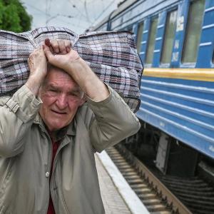 Ukrainians Flee To Escape Death