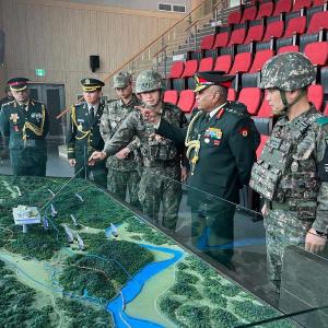 Army Chief In South Korea; Kim Celebrates In North