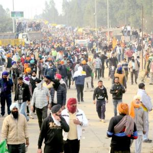 Farmers gathering to resume Delhi march face tear gas