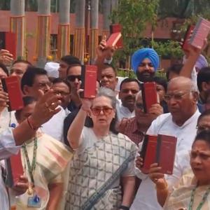 Oppn protests in Parl with Constitution copies in hands