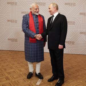 Modi Stands Out In A Room Of Suits