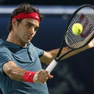 Federer floors Djokovic in Dubai semis