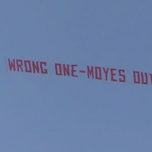 PHOTOS: Anti-Moyes banner flown over Old Trafford