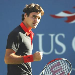 Federer triumphs to seal Swiss win over Italy