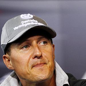 Schumacher handed grid penalty, Mercedes fined
