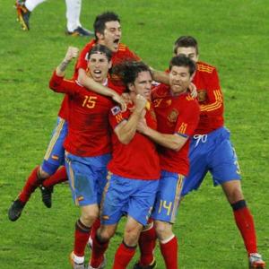 Images: Puyol heads Spain into maiden final