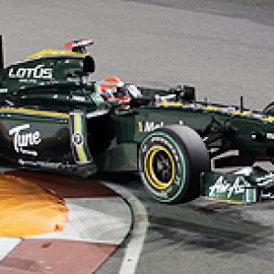 Lotus F1 team boss torn over name change