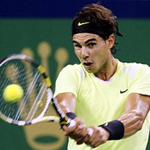 Nadal and Federer advance at Shanghai Masters