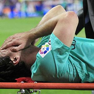 La Liga: Messi injured as Barca edge Atletico