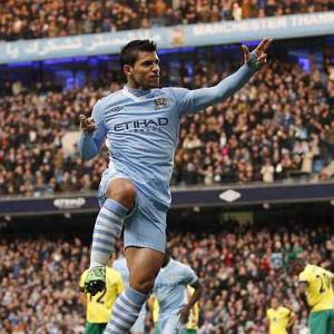 Images: Aguero magic helps leaders Man City march on