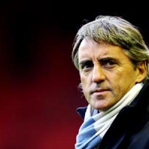 Mancini wants away-day cheer for Man City