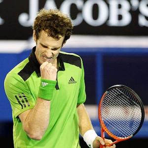 Images: Murray breaches Ferrer wall, Dulko-Pennetta win doubles