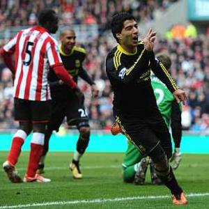 Slick Suarez seals Liverpool points