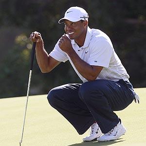 Golf: Tiger Woods takes lead at Australian Open