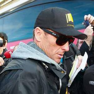 Lance Armstrong gives up fight against USADA charges