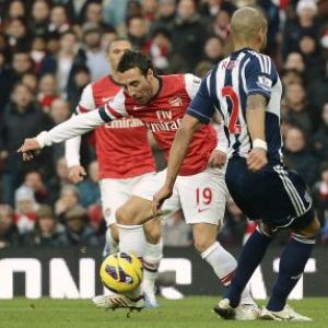 Arsenal midfielder Cazorla's tumble sparks diving debate