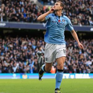 PHOTOS: Dzeko sizzles for City; United stay on top