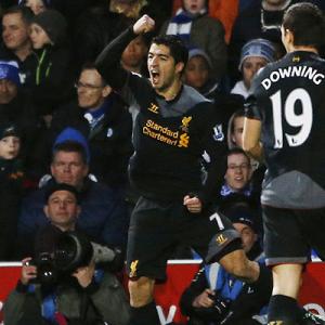 Liverpool's Suarez drowns controversies with consistency