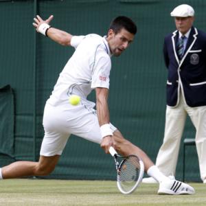 Wimbledon Images: Djokovic, Federer have it easy