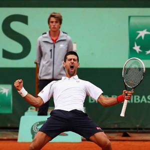 PIX: Federer, Djokovic rally into French Open semis