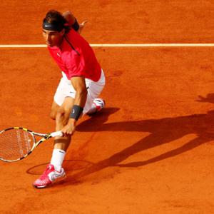 Nadal follows Federer into elite French Open club