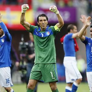 Defending champs Spain held by Italy, Croatia impress