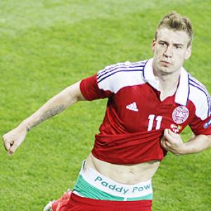 Bendtner banned, fined 100,000 euros for pants stunt
