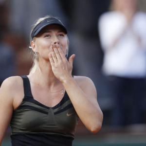 Sharapova comes back down to earth at Wimbledon
