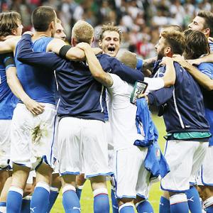 PHOTOS: Balotelli heads Italy into final