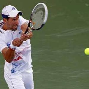 Djokovic subdues aggressive Stakhovsky in Dubai