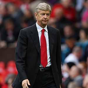 Wenger charged with improper conduct by UEFA