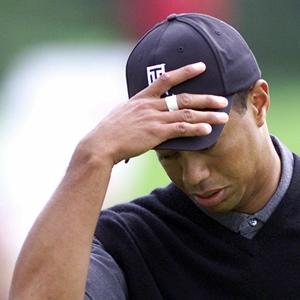 Injured Woods withdraws from WGC