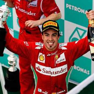 PHOTOS: Alonso wins Malaysian GP, Perez finishes second
