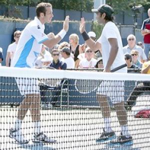 Paes in quarters of men's, mixed doubles