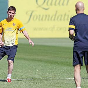 Barca's Messi returns to training camp