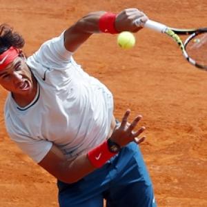 Barcelona Open: Ferrer shocked, Nadal eases through