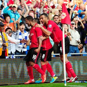 European football PHOTOS: Cardiff upset City; Barca scrape past Malaga